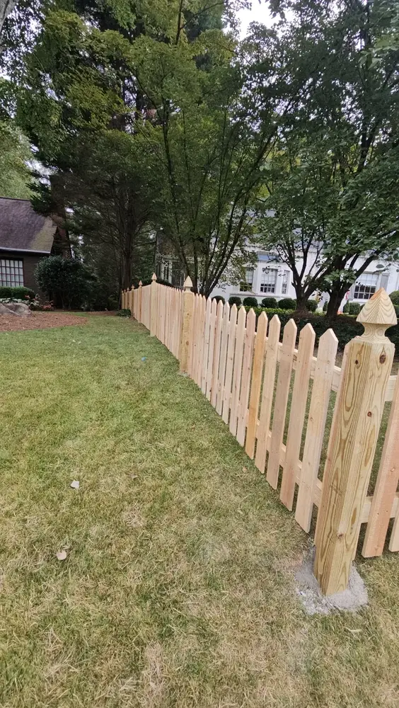 Wood picket fence installation