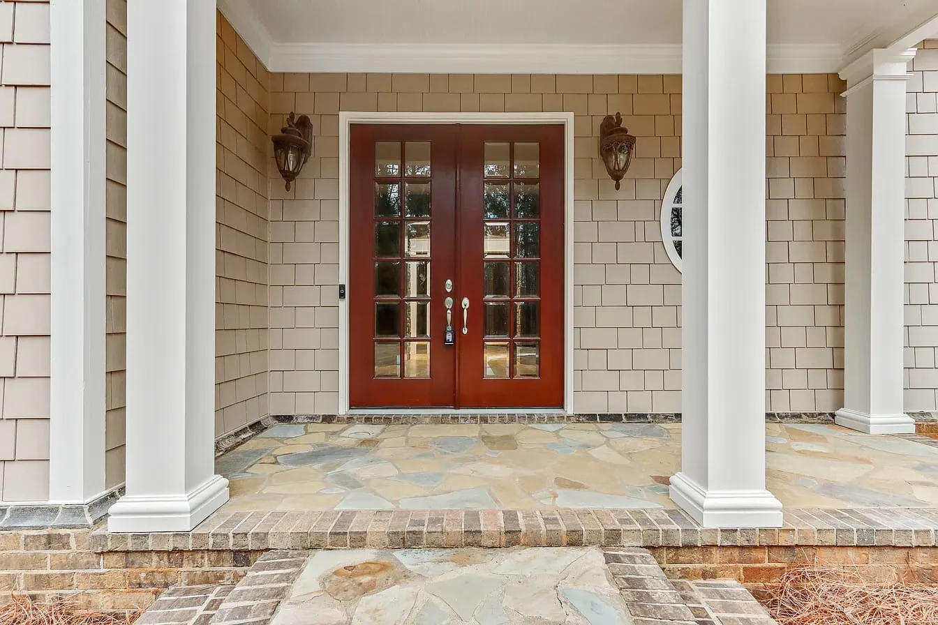 Front door and stone porch