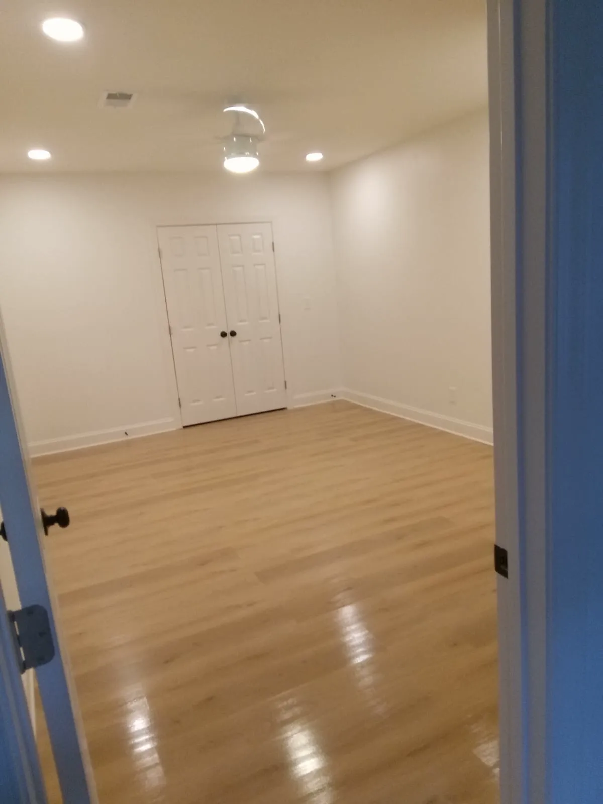 Bedroom with hardwood floors
