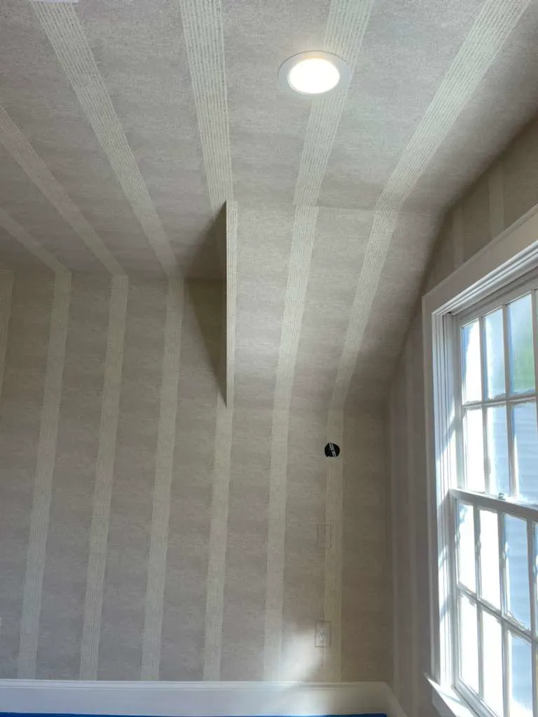 Vaulted ceiling with custom wallpaper